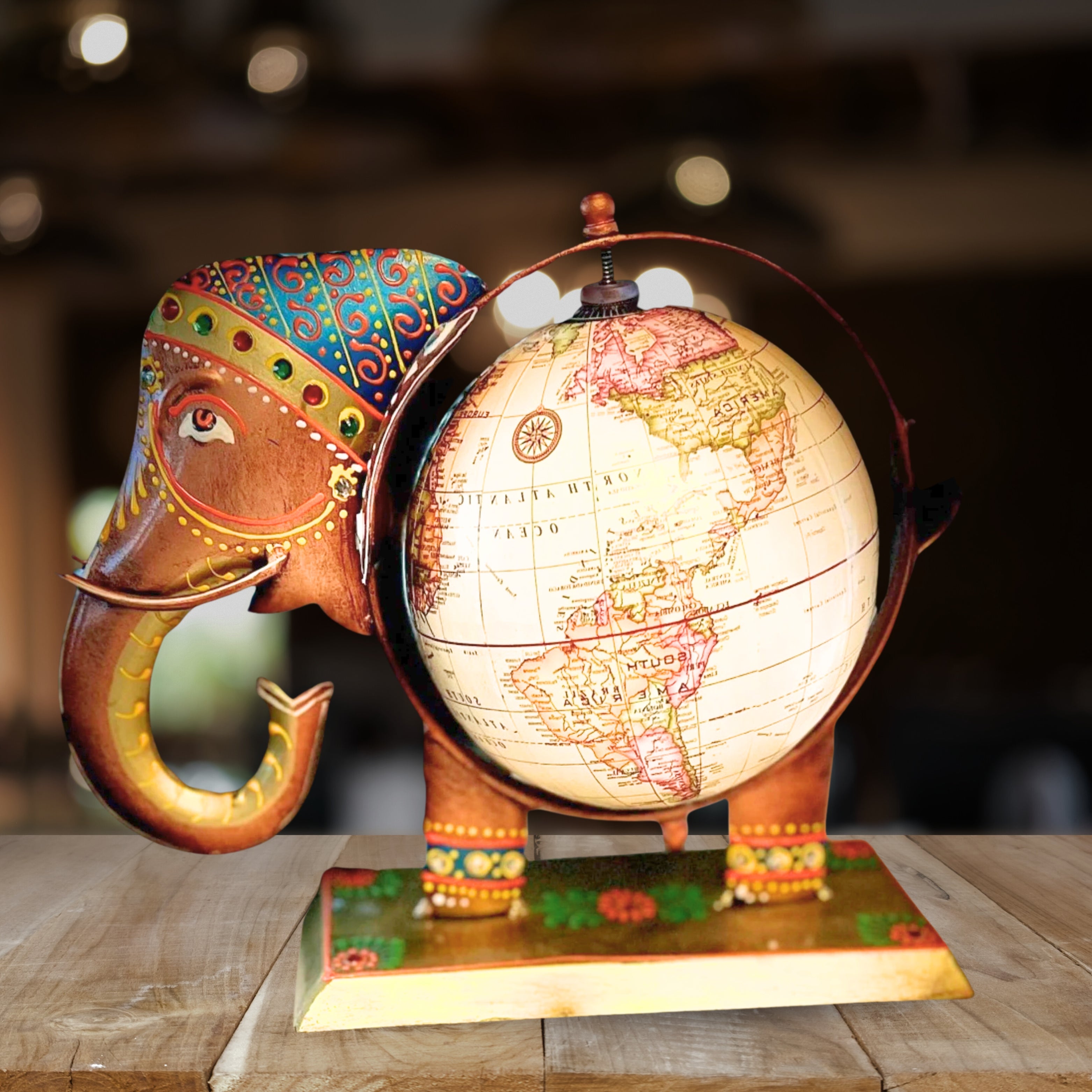 Handcrafted metal elephant globe