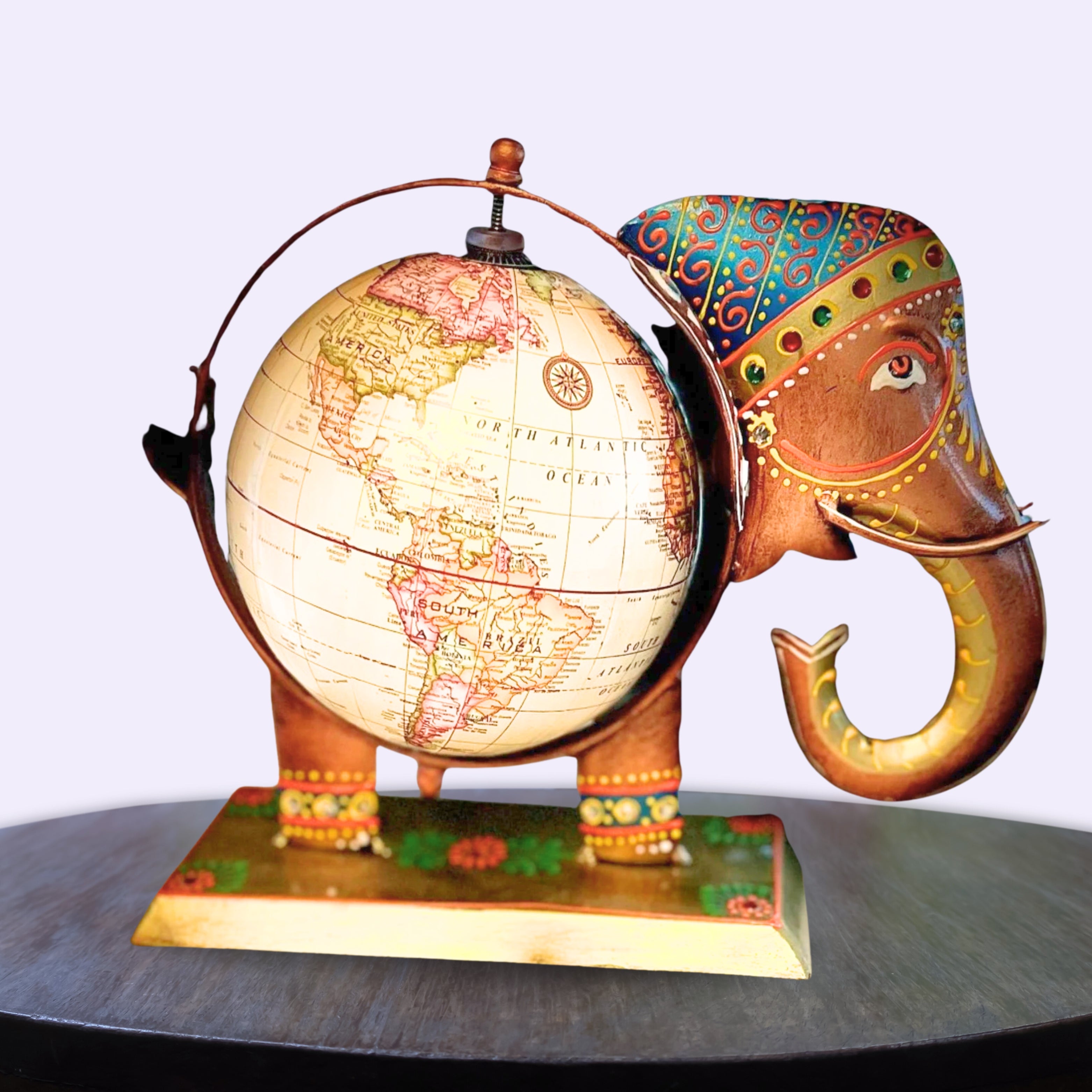 Handcrafted metal elephant globe