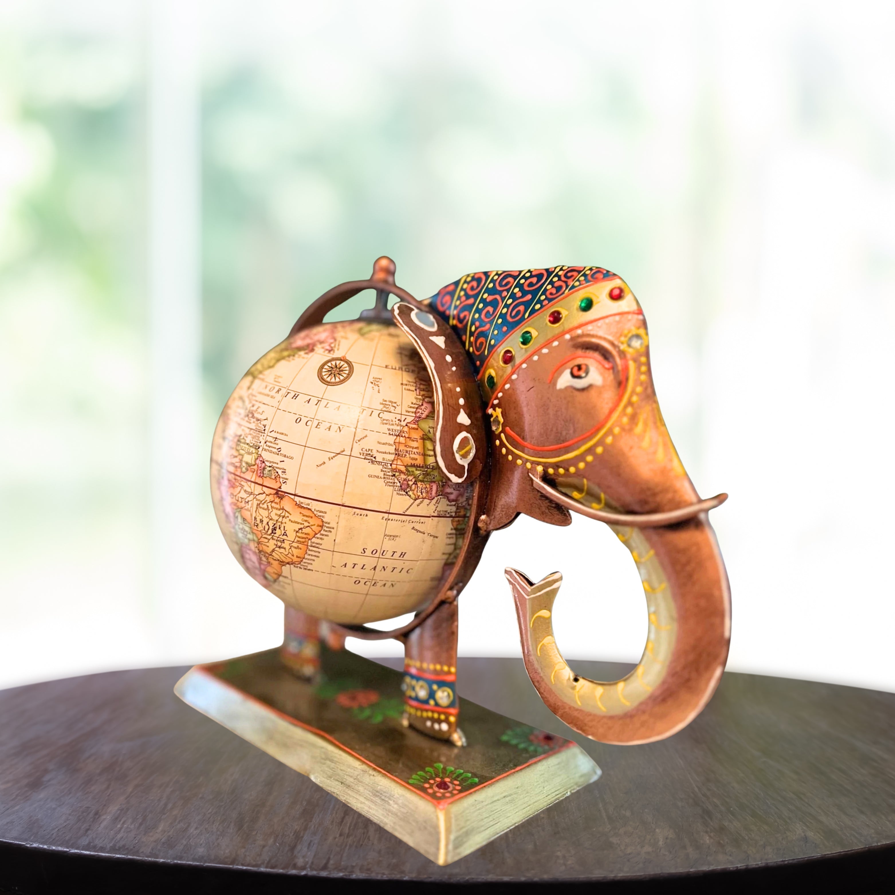 Handcrafted metal elephant globe